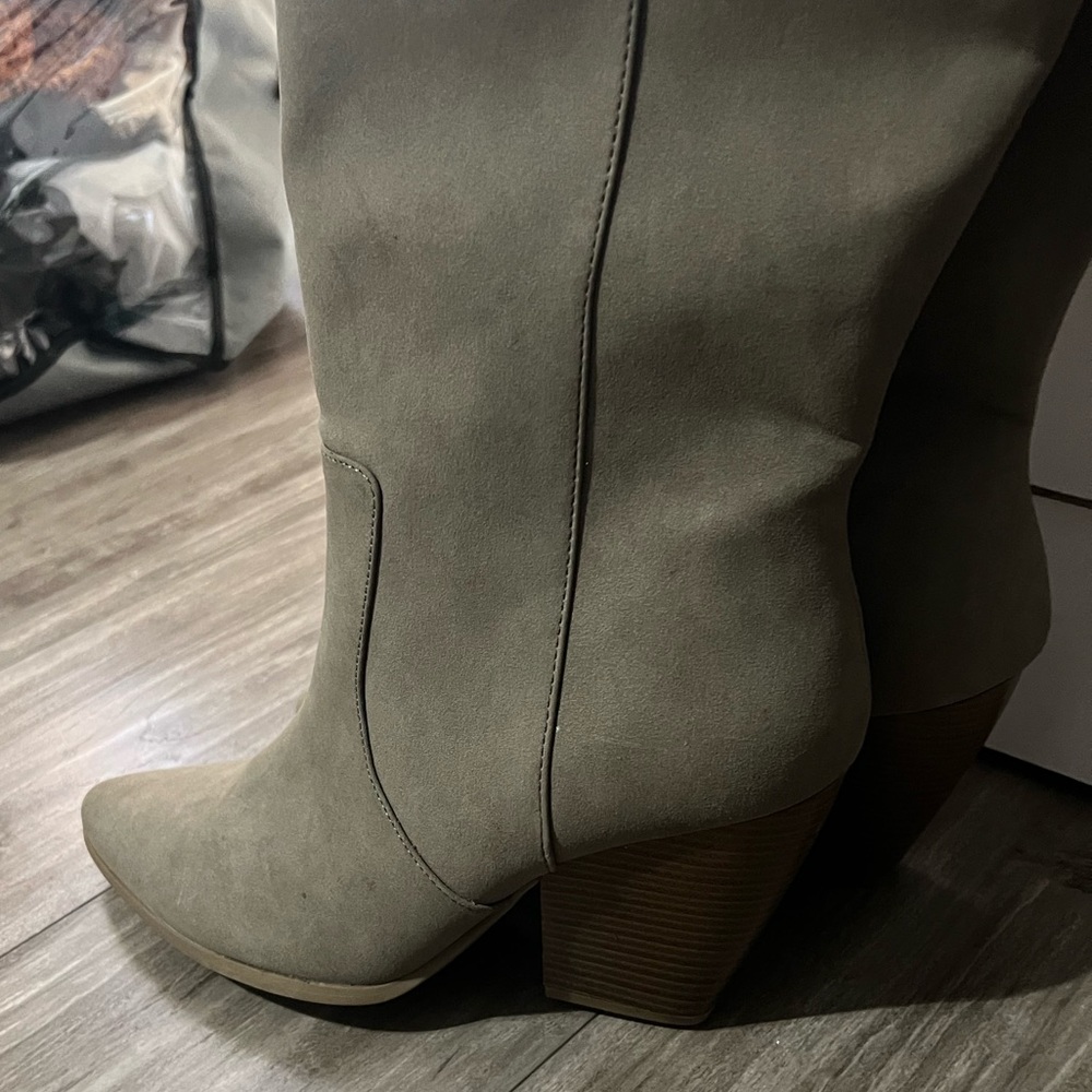 Tall, cowboy style boots